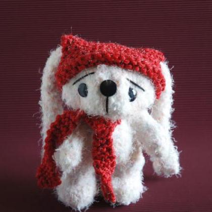 Pastel Pink White Rabbit In A Red Hat And Scarf.